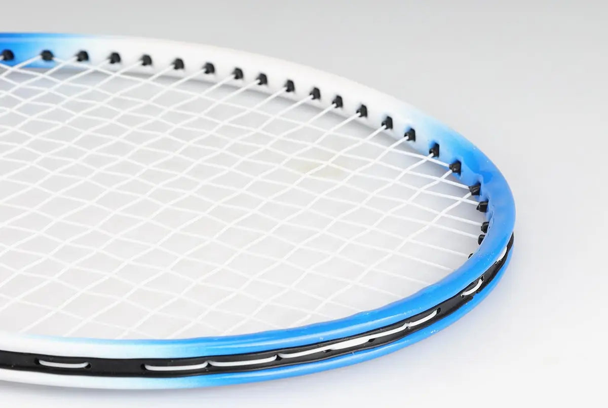 2 raquetas de tenis, bolsa y pelota de juego