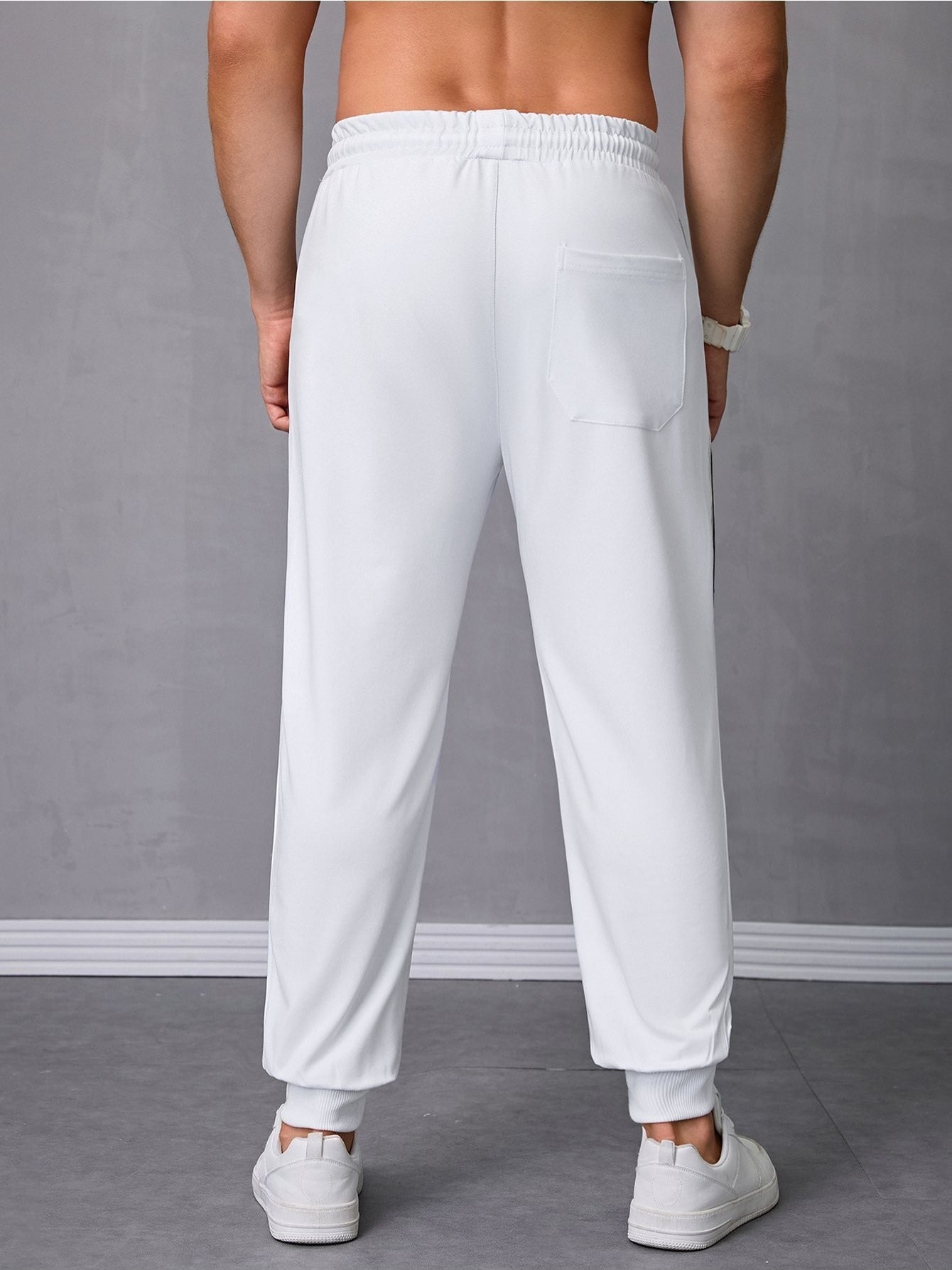 Pantalones deportivos para hombre con cordón y bolsillos con cierre